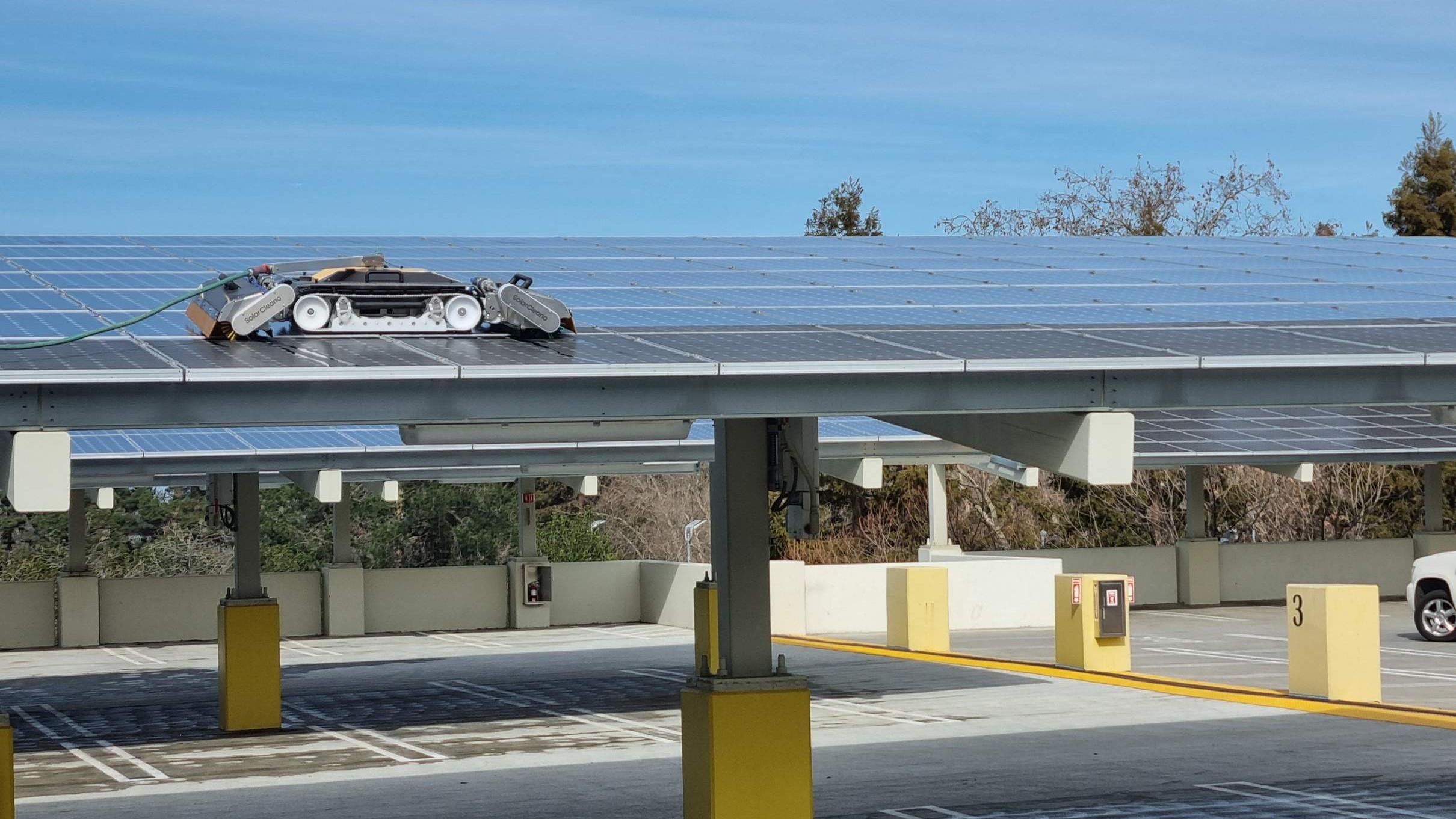 SolarCleano robot cleaning a solar carport array - Every Detail Solar
